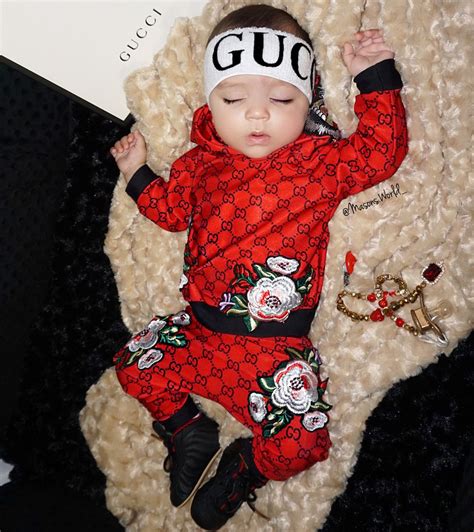 newborn gucci baby grow|newborn baby wearing Gucci.